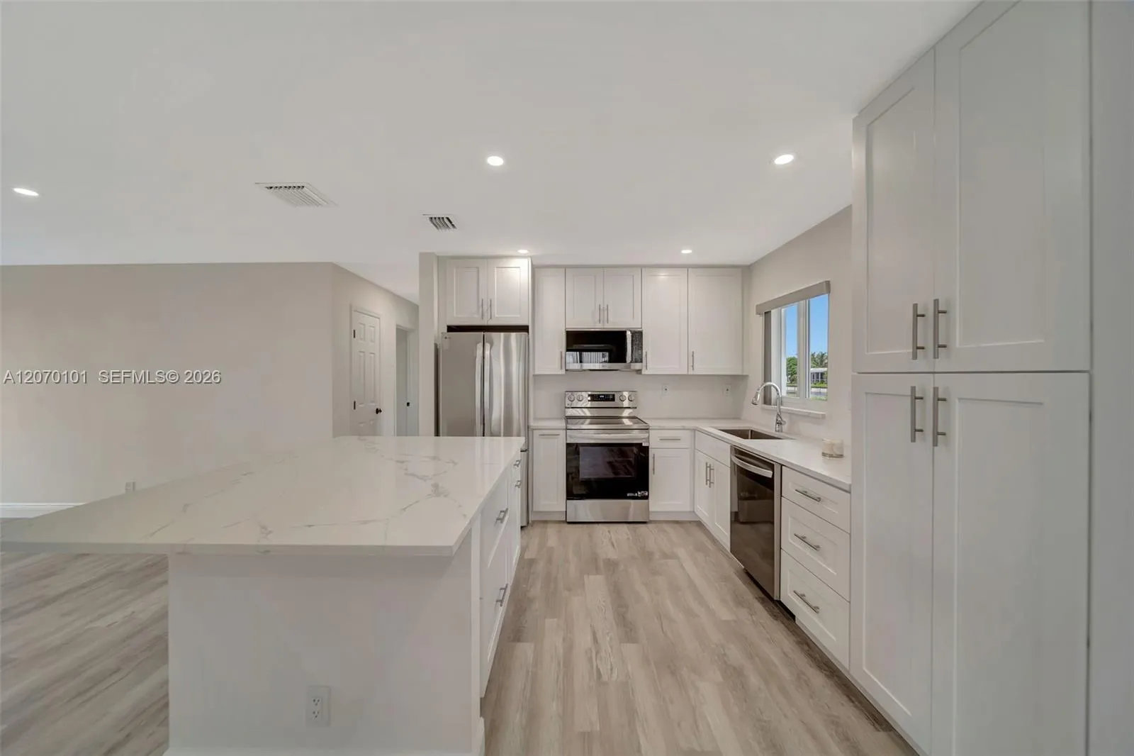 Straight-on, cabinets/stove/sink