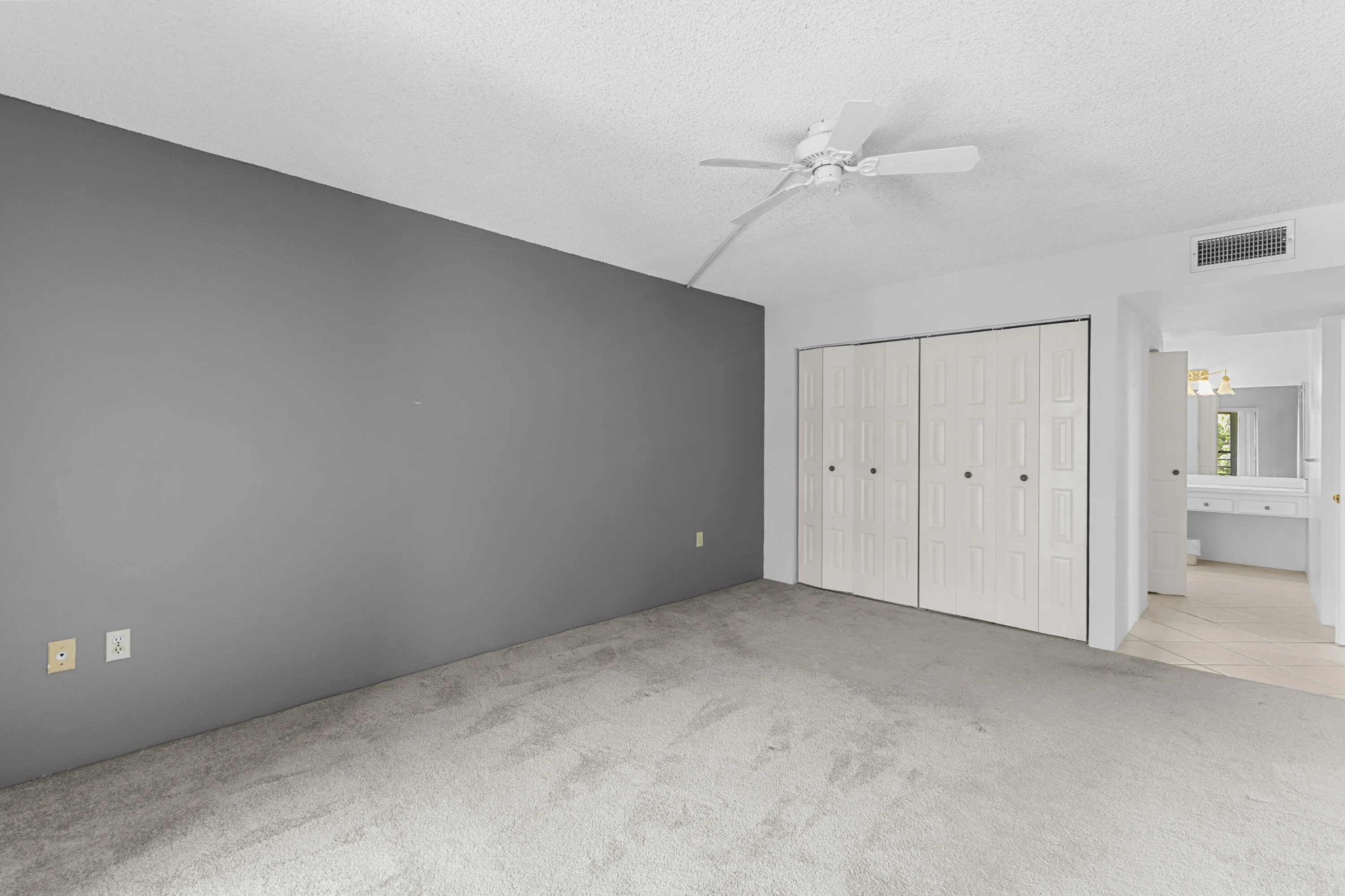 Primary bedroom with a view of the second closet (the walk in closet in behind it)