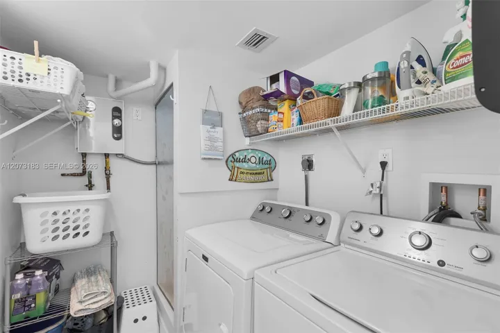 Dedicated laundry room with new washer/dryer