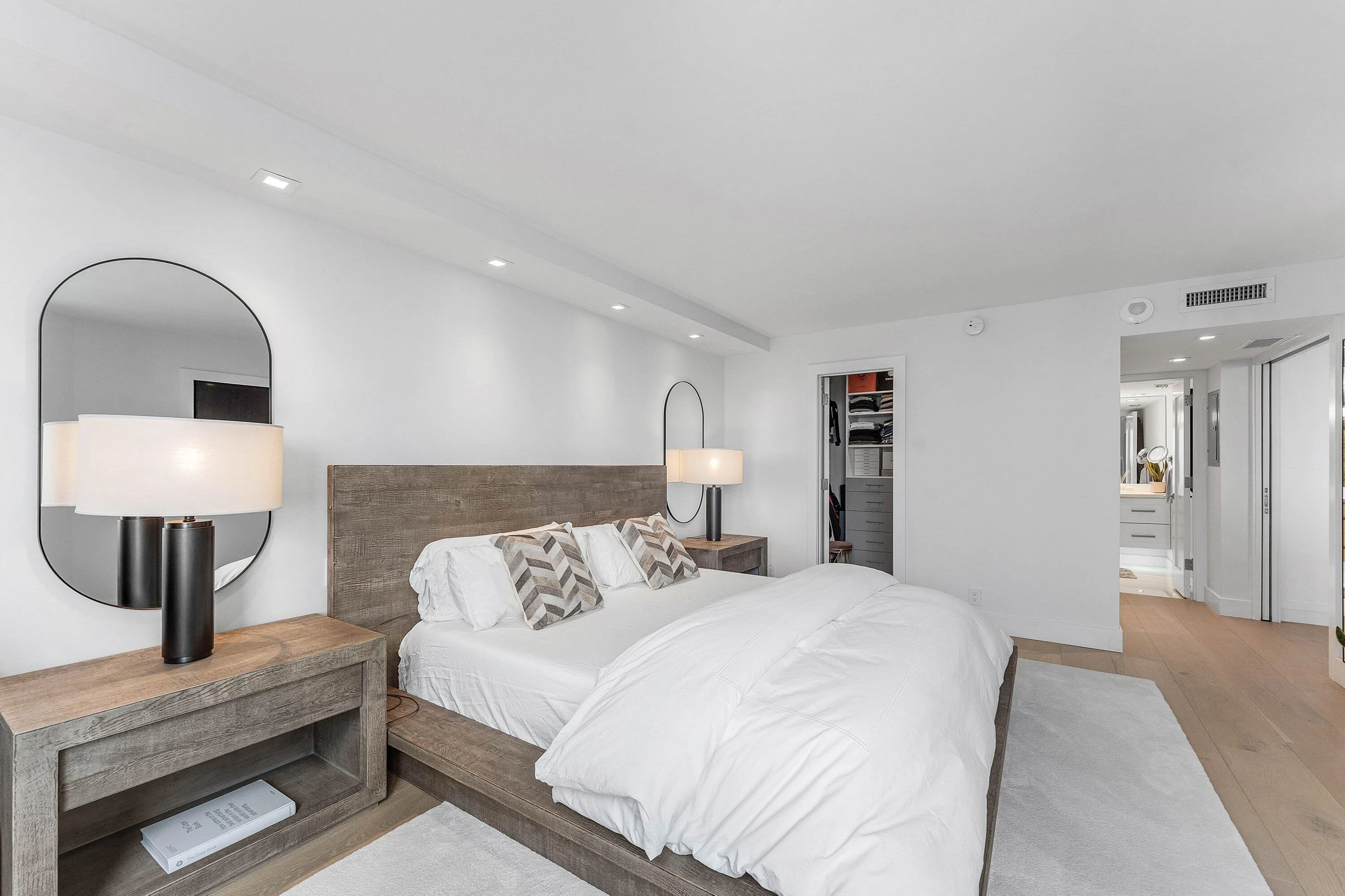 Recessed lighting, wood-finish flooring, and built-in closet storage