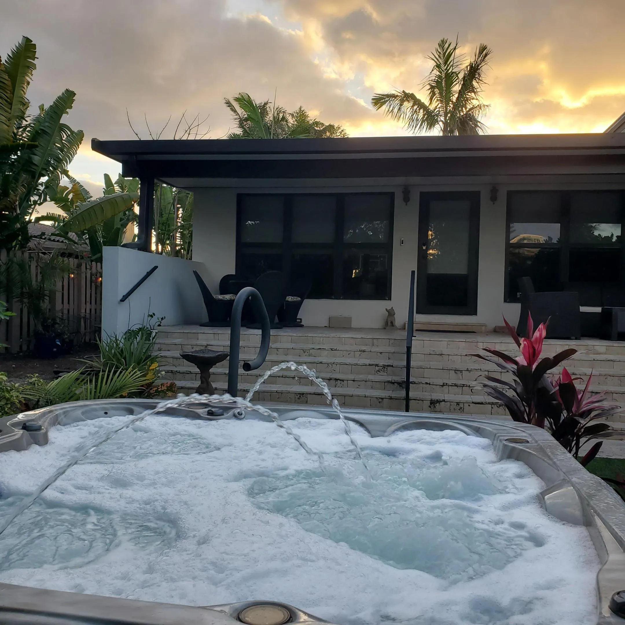 Front Patio/Porch and hot tub.