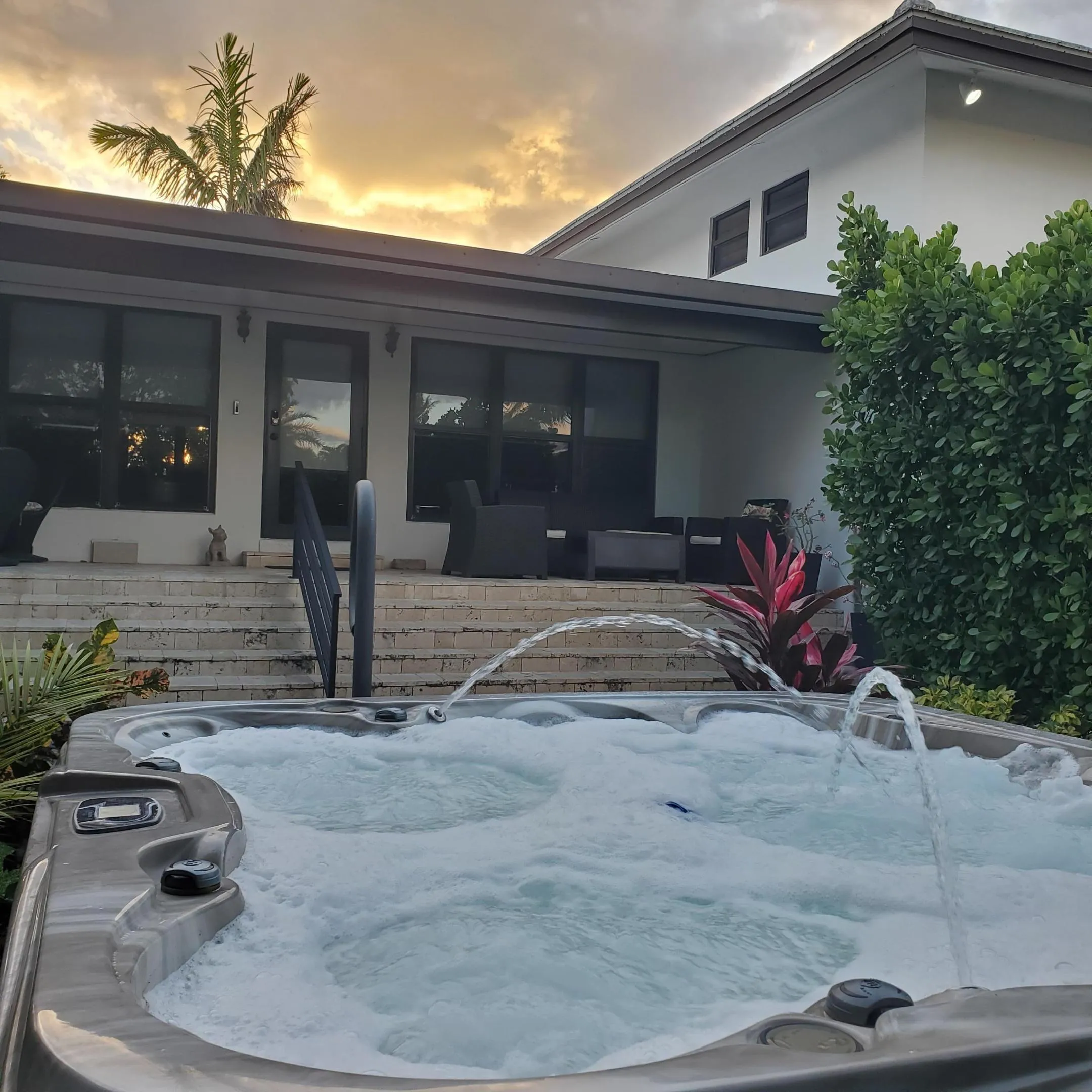 Front Patio/Porch and hot tub.