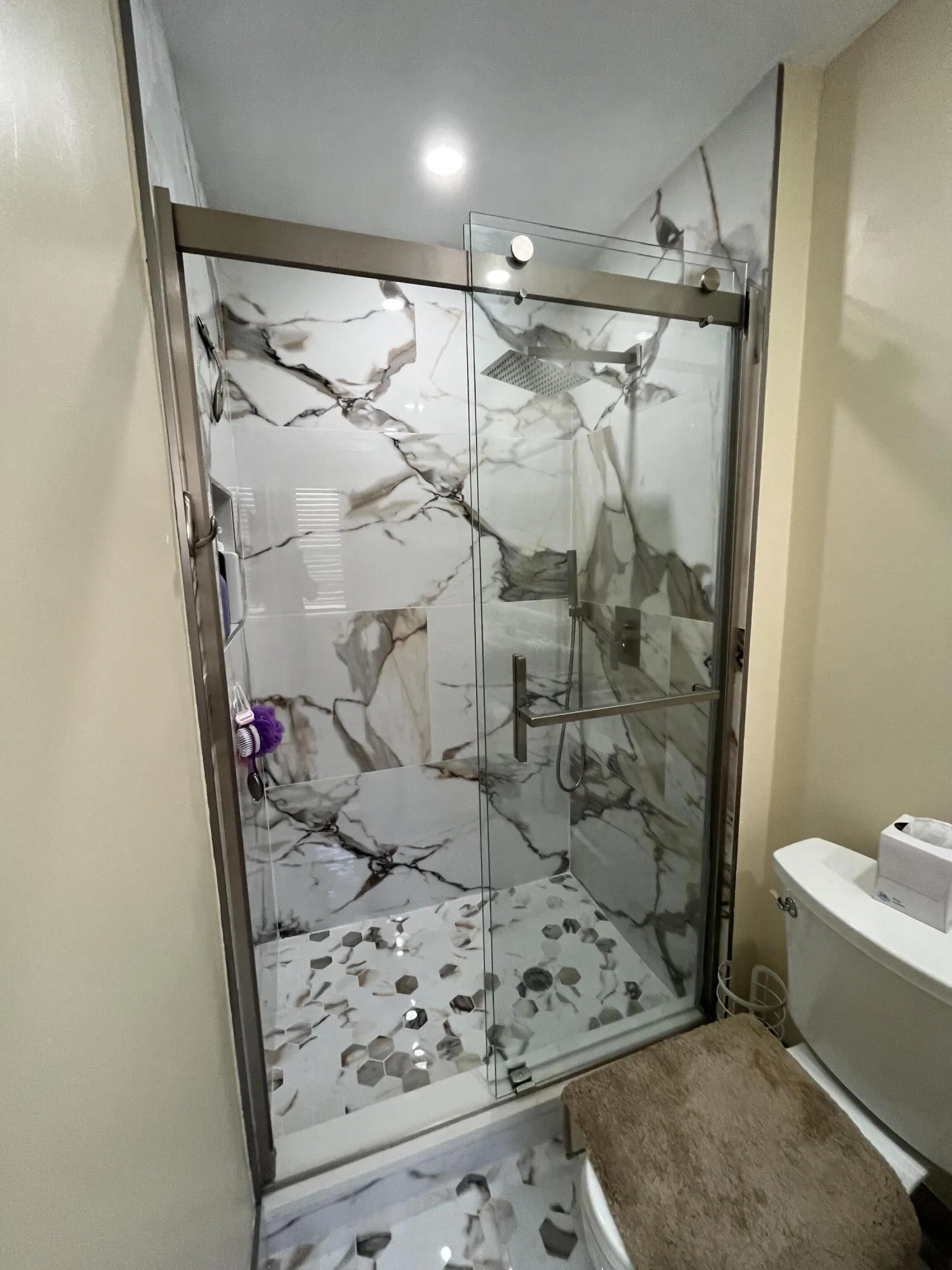 stall shower in the primary bathroom