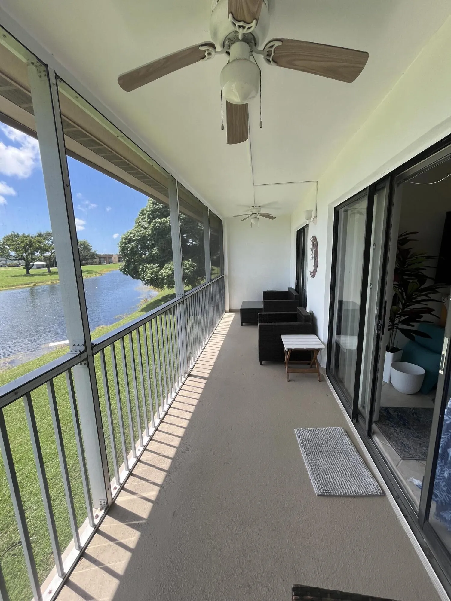 huge screened in patio with addtl. storage closet