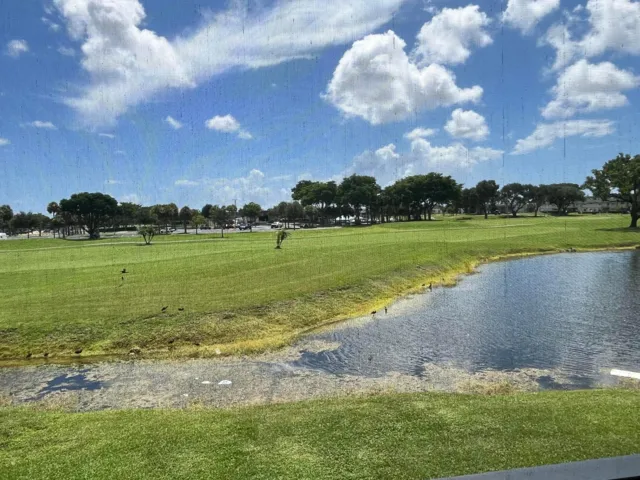 golf course and lake views from your screened in patio.