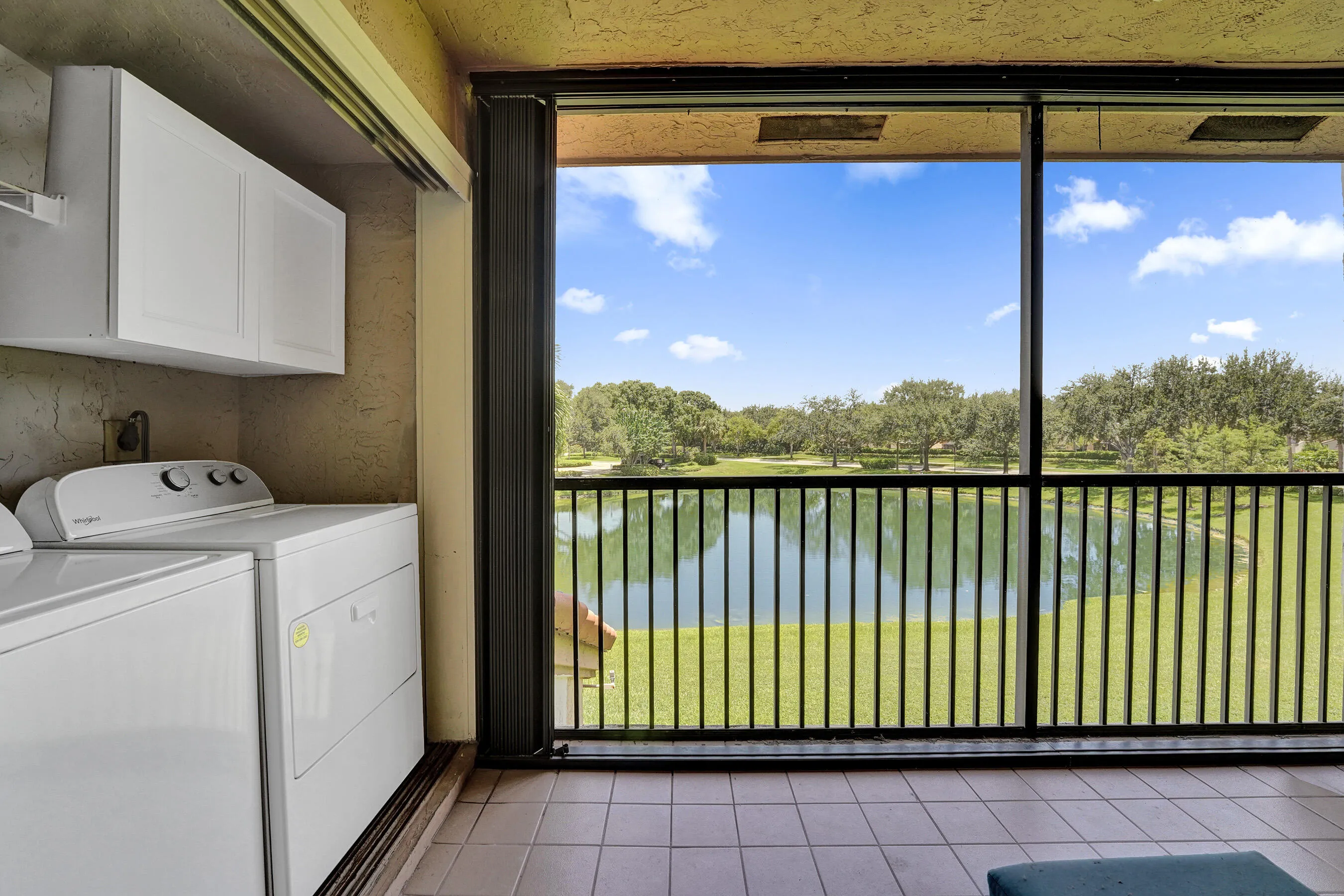 Screened, covered Balcony