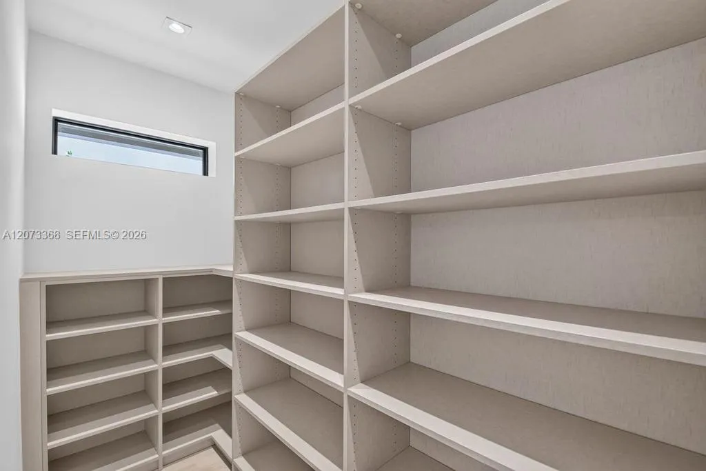 Custom Hideaway pantry shelving Custom Hideaway pantry shelving