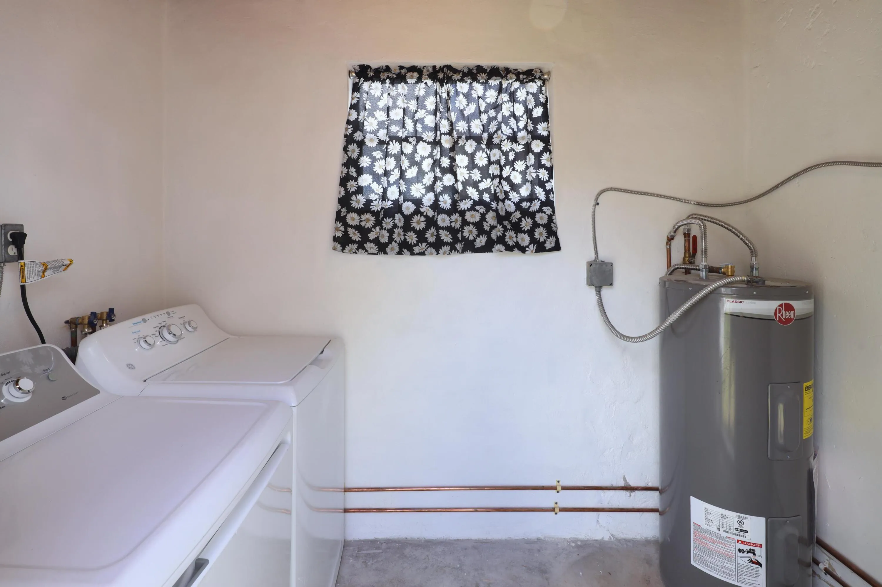 Attached laundry area with newer washer and dryer, new water heater and electrical panel. Major improvements make this Fort Lauderdale home a great first time buyer opportunity.