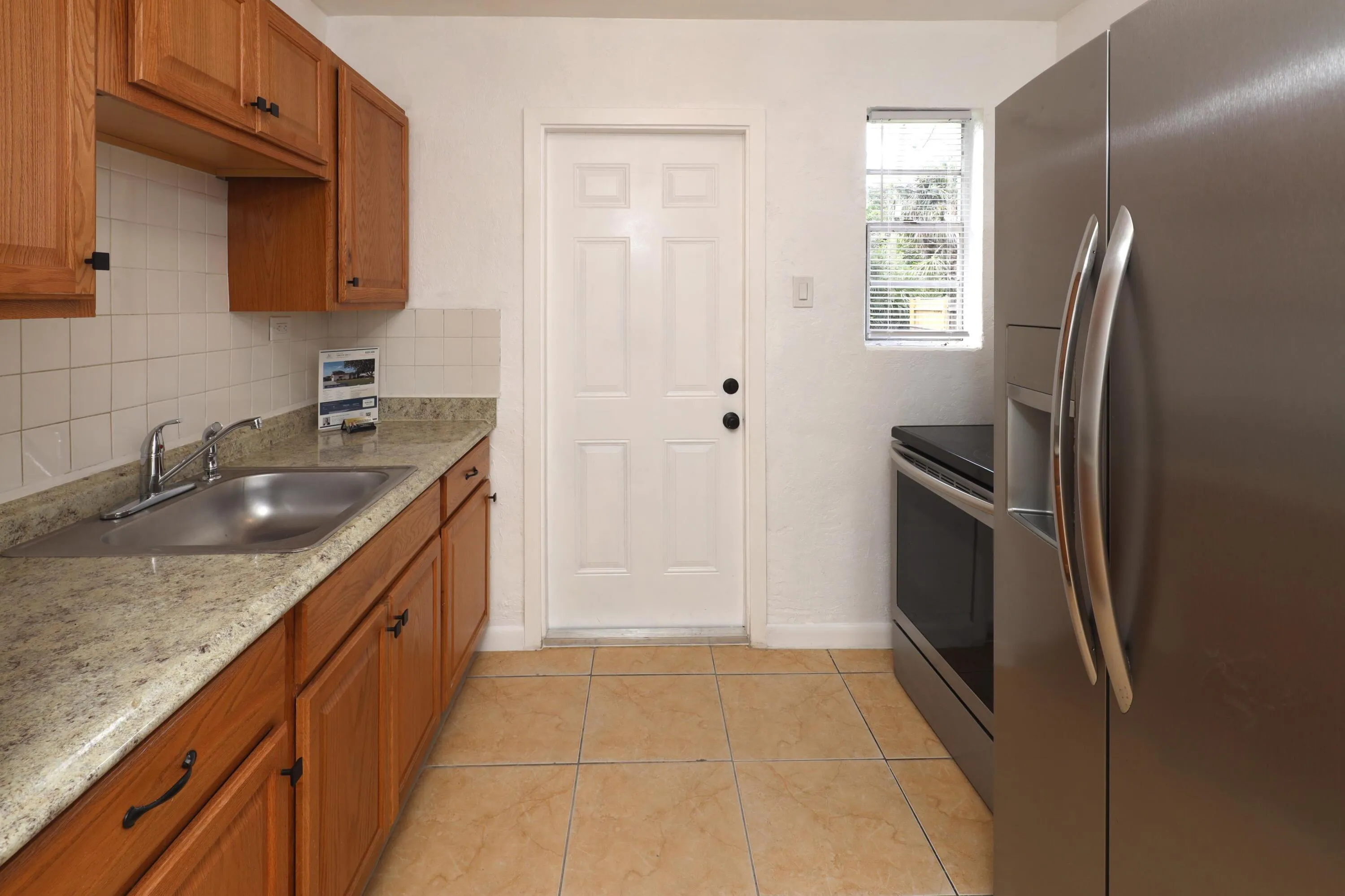 Updated kitchen with new kitchen cabinets in this affordable Fort Lauderdale single family home. Great opportunity for first time homebuyers or investors.