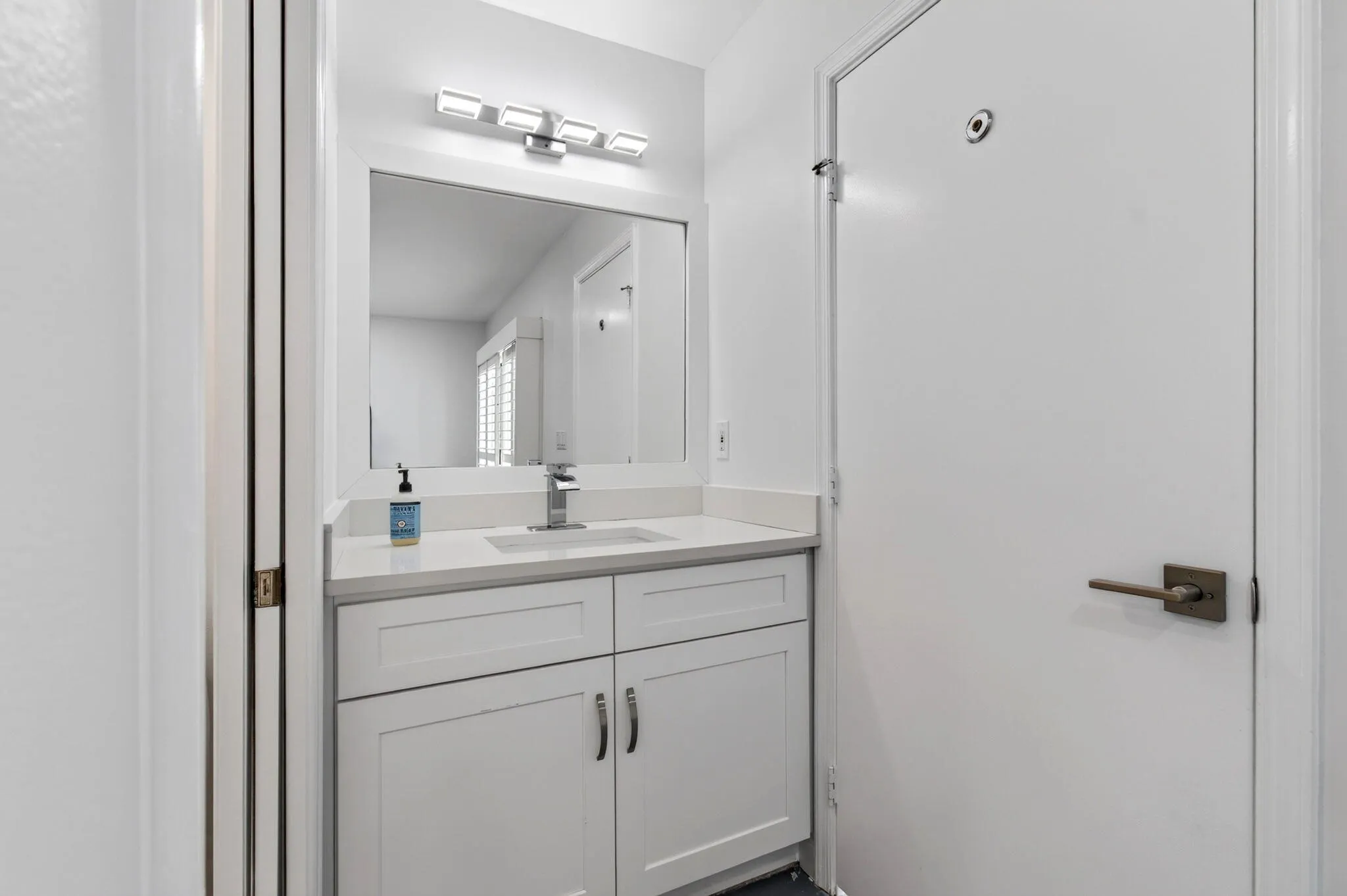 with Updated Vanity Cabinets & Top