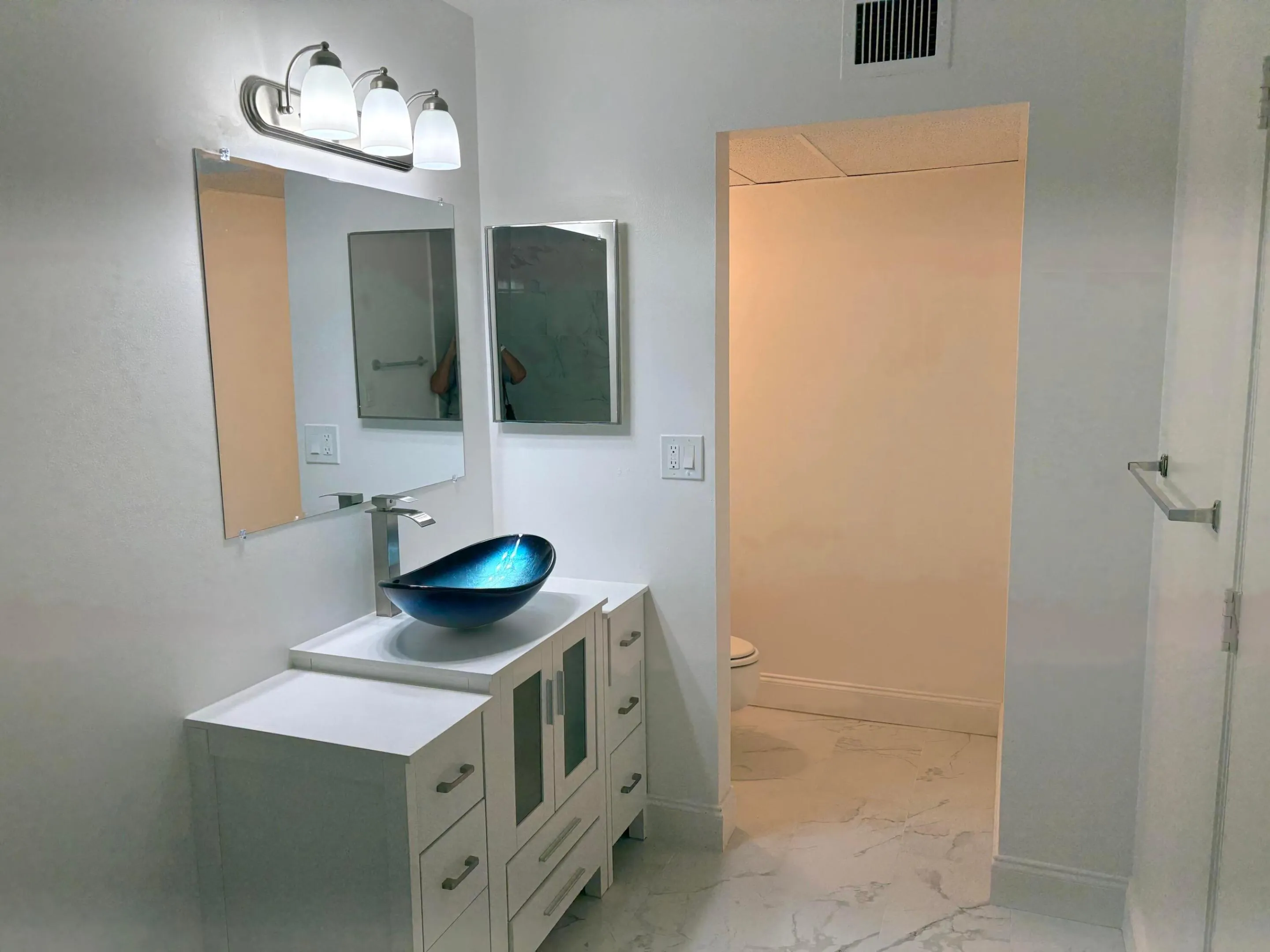 ANOTHER VIEW, LOOKING TOWARDS THE BATHROOM TOILET