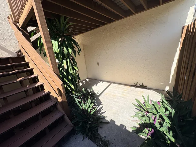 YOUR GATE OPENS UP TO 1st FLOOR COURTYARD WITH STAIRS.