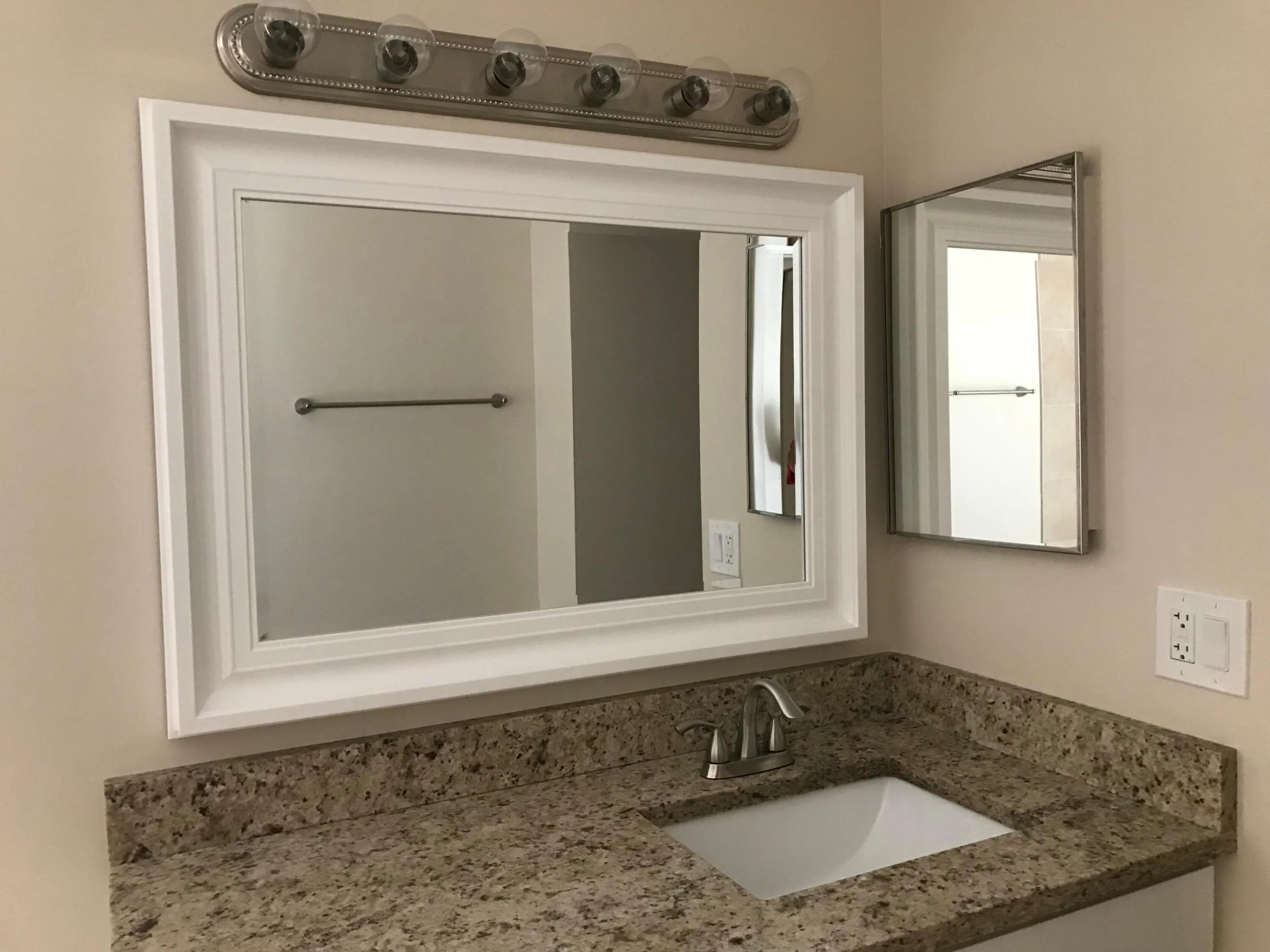 GRANITE COUNTER TOPS IN KITCHEN AND BATHROOM