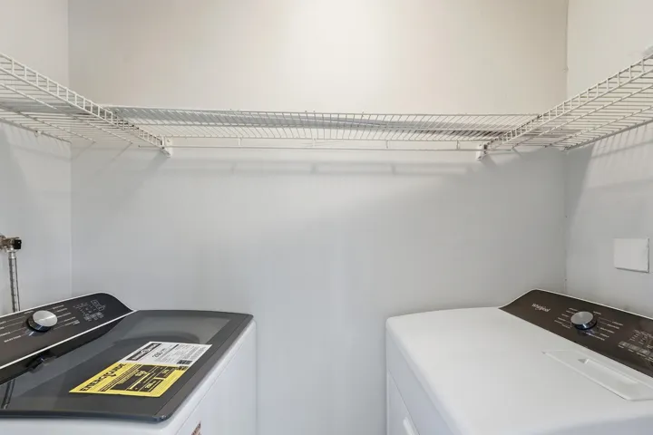 Integrated laundry area with built-in wire shelving