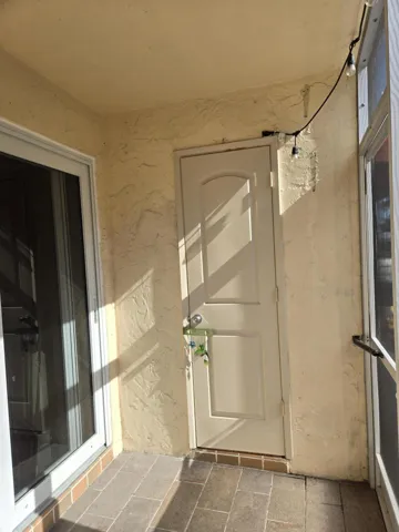 Storage closet on screened in porch