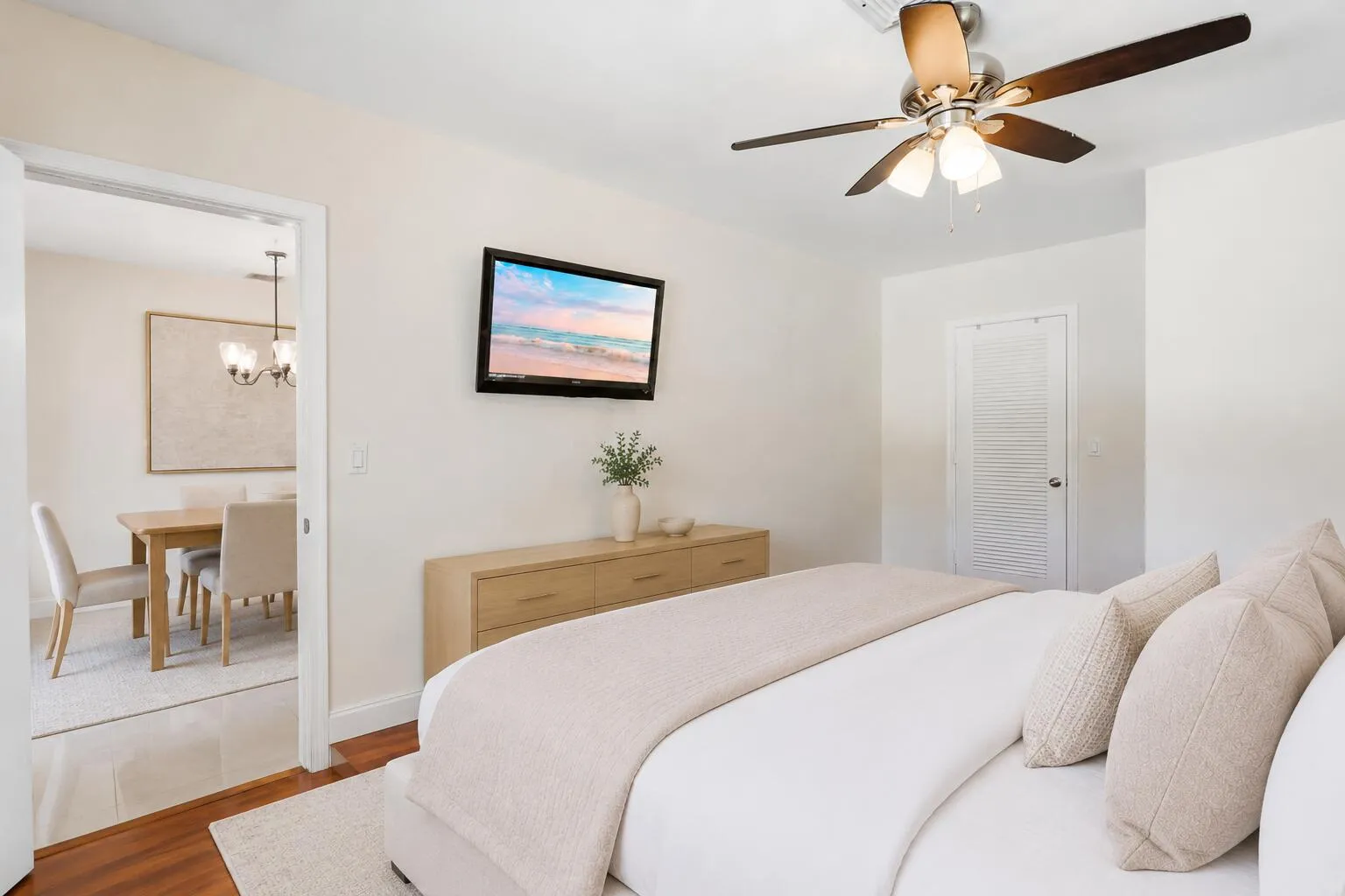 Primary bedroom with walk-in closet. (virtually staged for illustrative purposes; no permanent features or finishes have been altered)