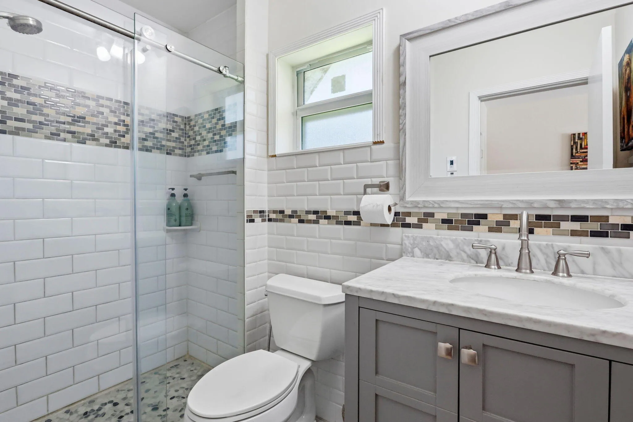 Primary bathroom. (virtually staged for illustrative purposes; no permanent features or finishes have been altered)