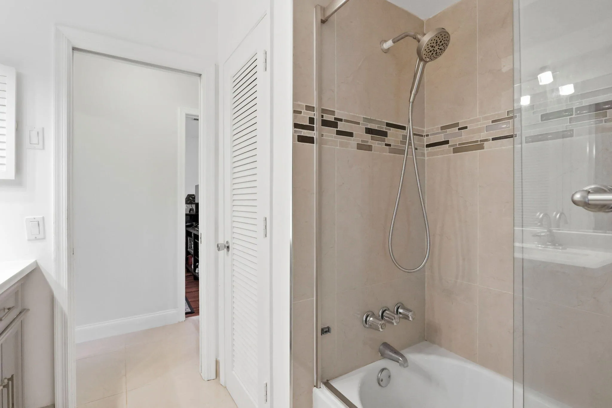 cabana bathroom for bedrooms and guests. (virtually staged for illustrative purposes; no permanent features or finishes have been altered)