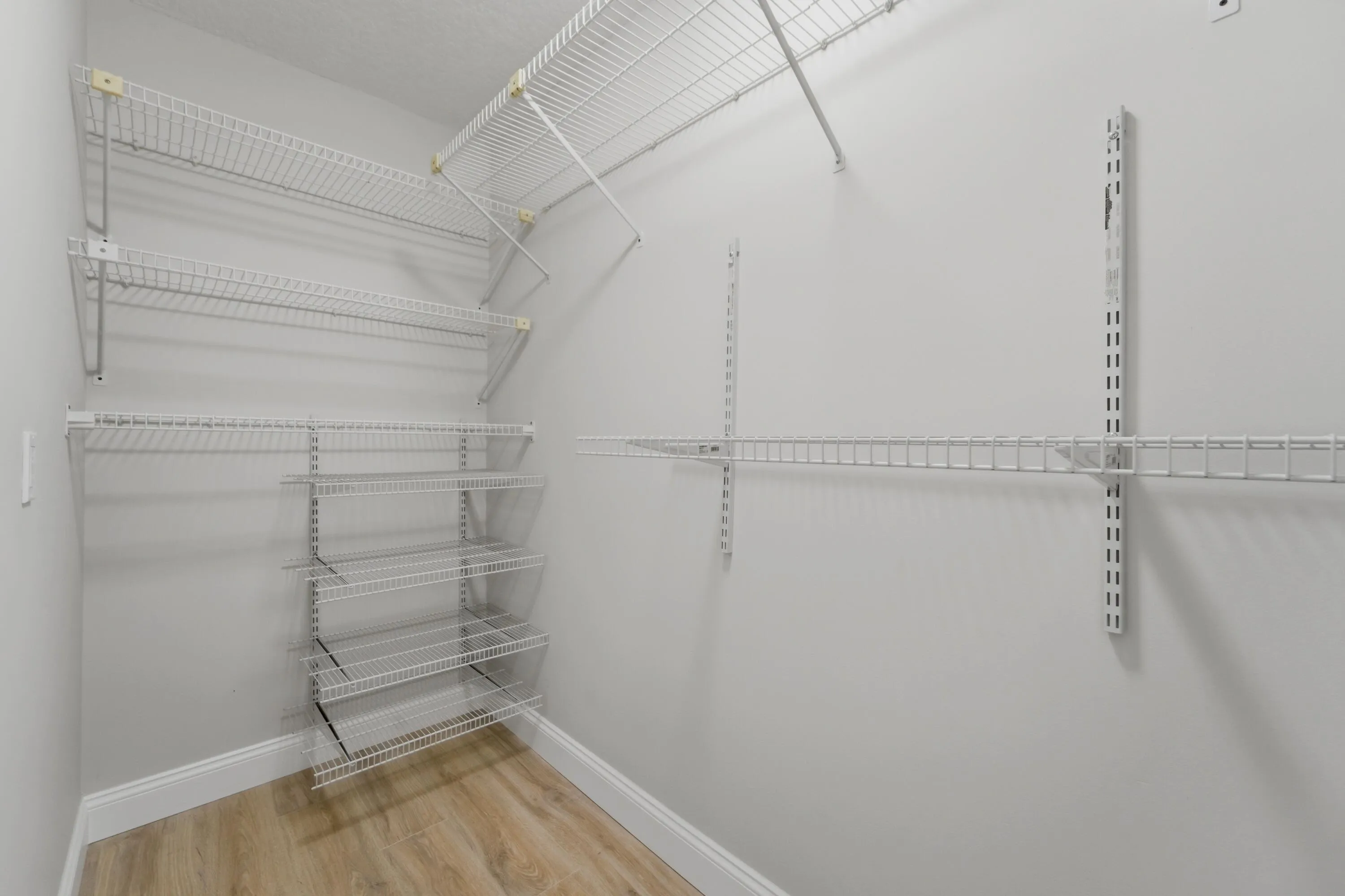 Primary Bedroom Walk In Closet