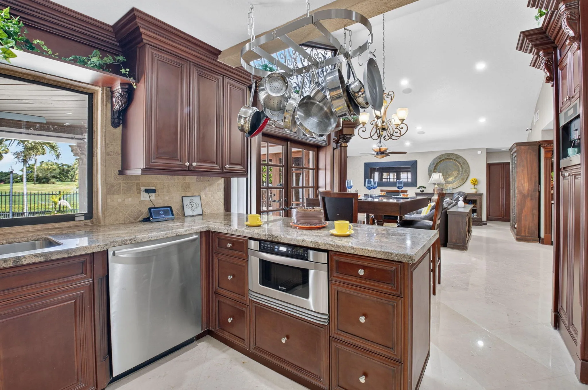In cabinet microwave. All stainless steel appliances. Plenty of natural light.
