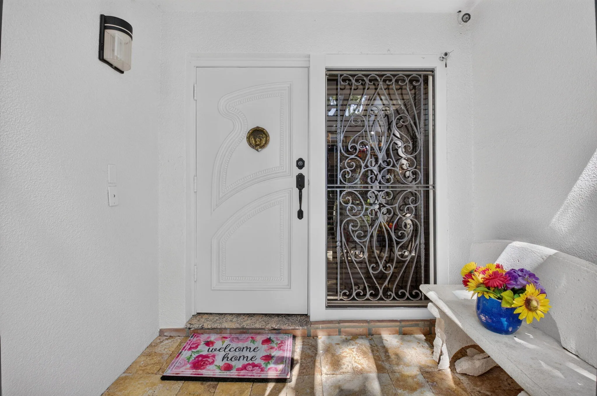 Inviting front entry with a double sidelight.
