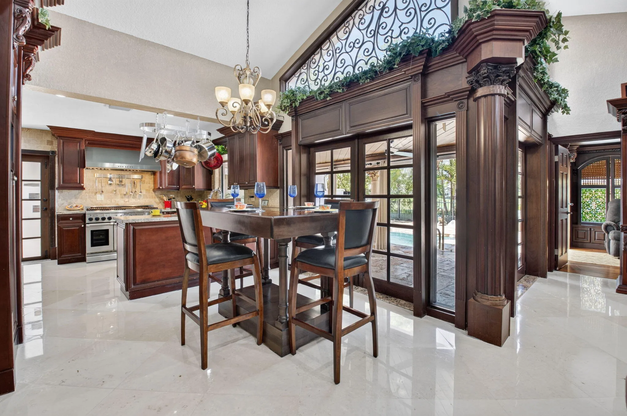 Dining area opens with French doors leading to amazing OUTDOOR OASIS!