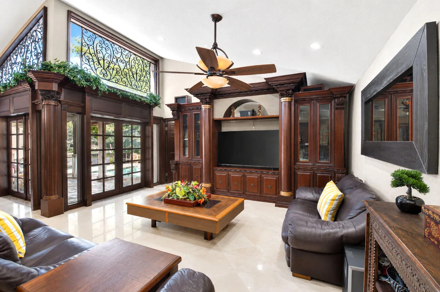 Step inside this home with unmistakable character. Dramatic architectural details and rich custom millwork.