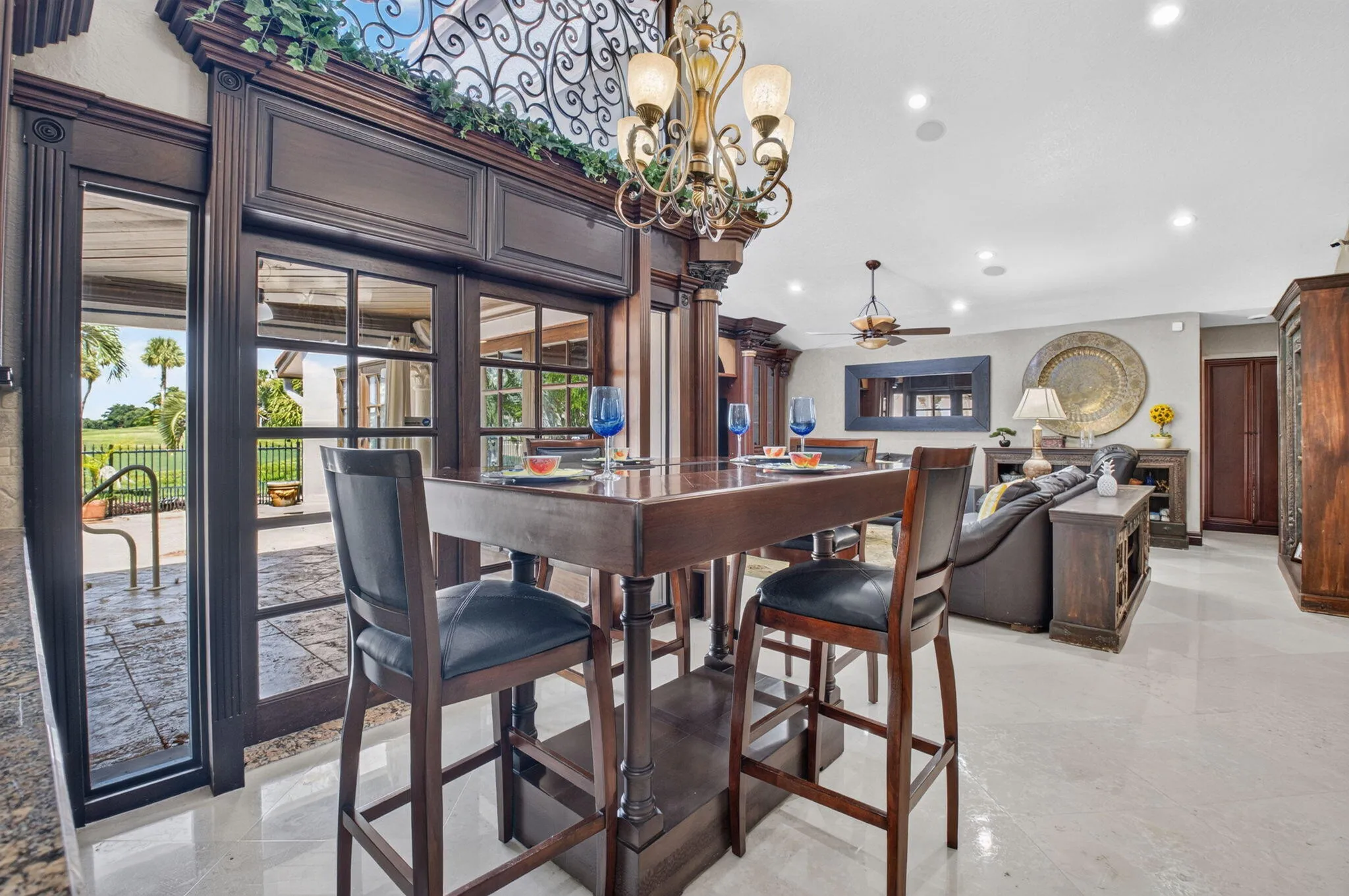 Entertaining is a breeze in your spacious living area overlooking the heated salt water pool.