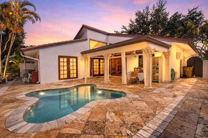 Timeless elegance on the GOLF Course with a private POOL and tropical retreat. Travertine XL pool deck and 20x11 covered patio.