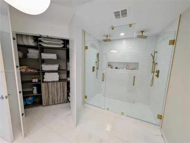 Master bathroom shower and added closet