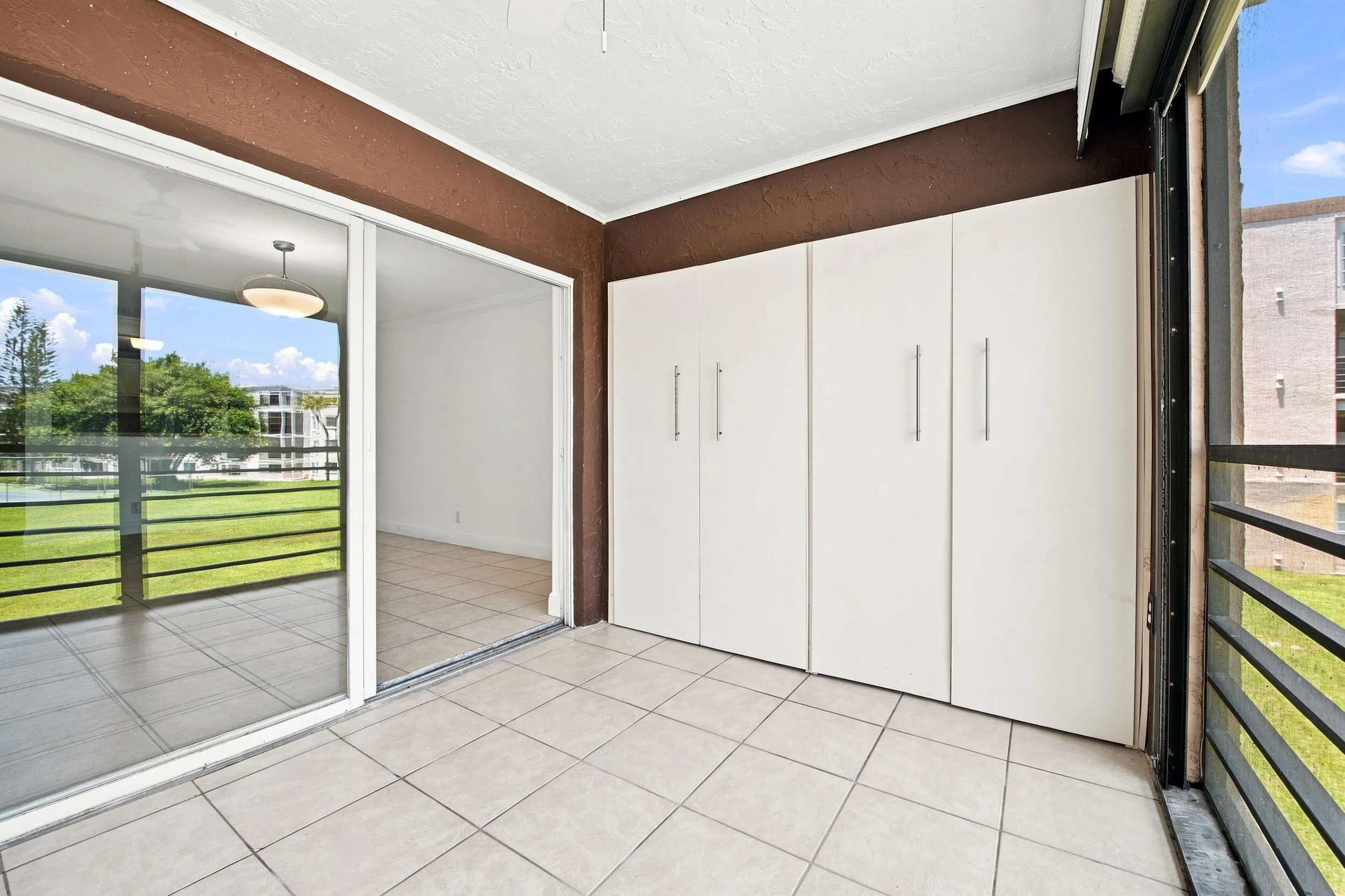 Screened-in Balcony with storage