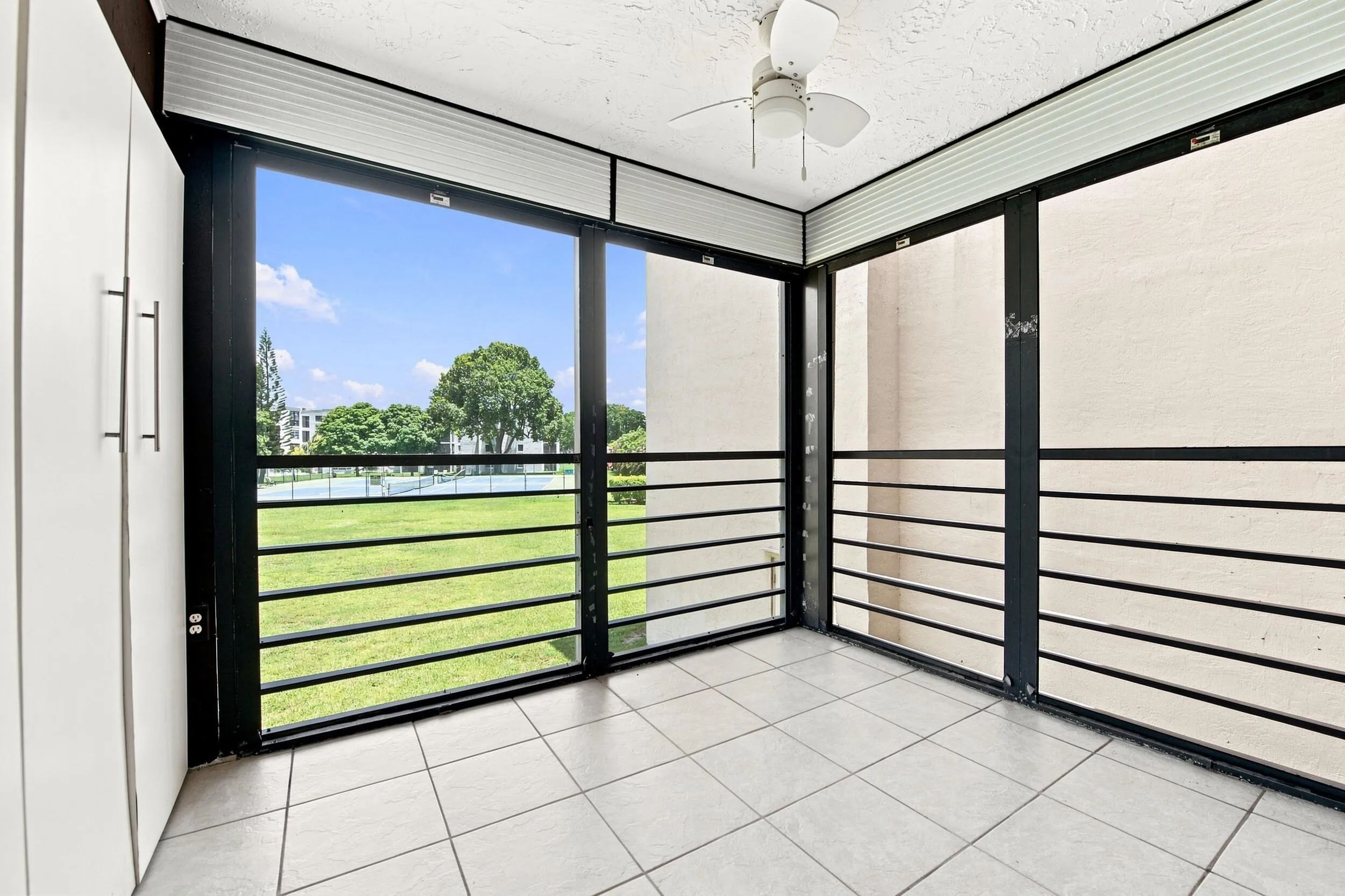 Screened-in Balcony with storage