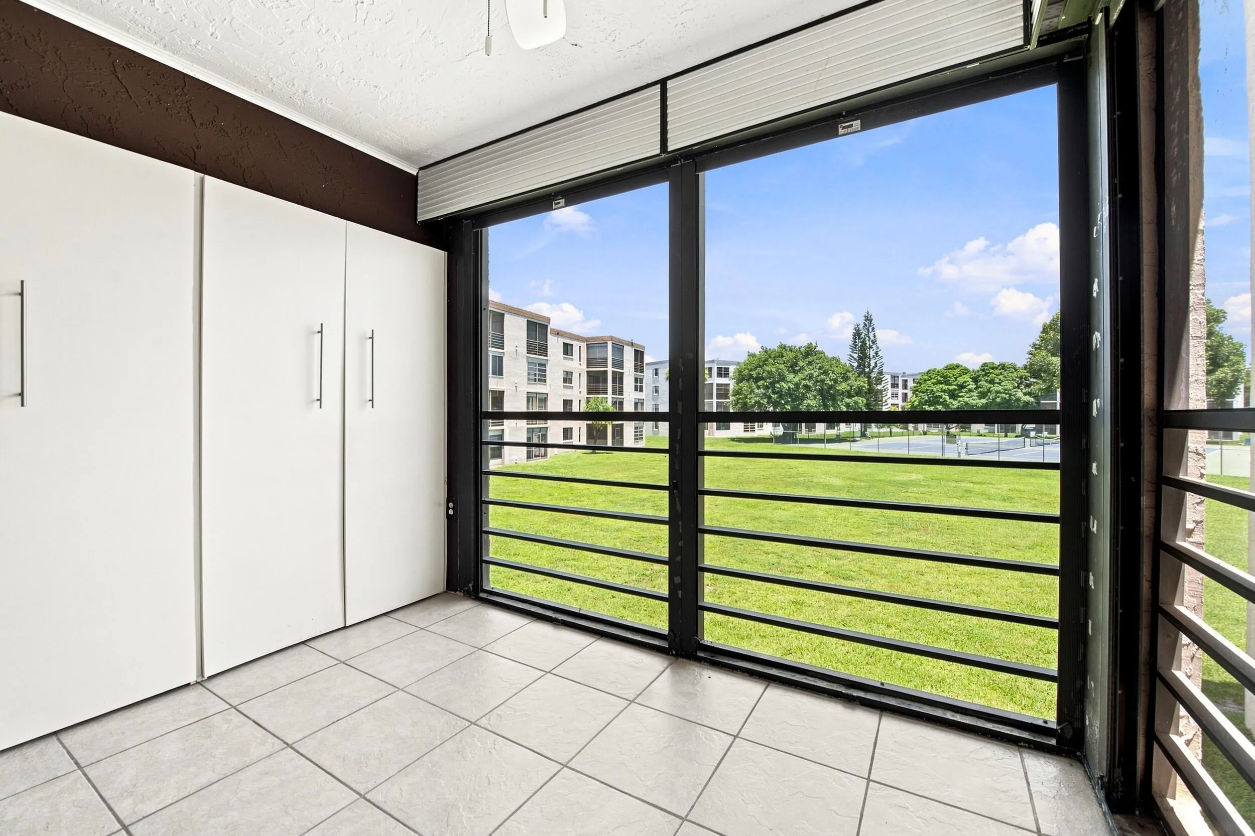Screened-in Balcony with storage