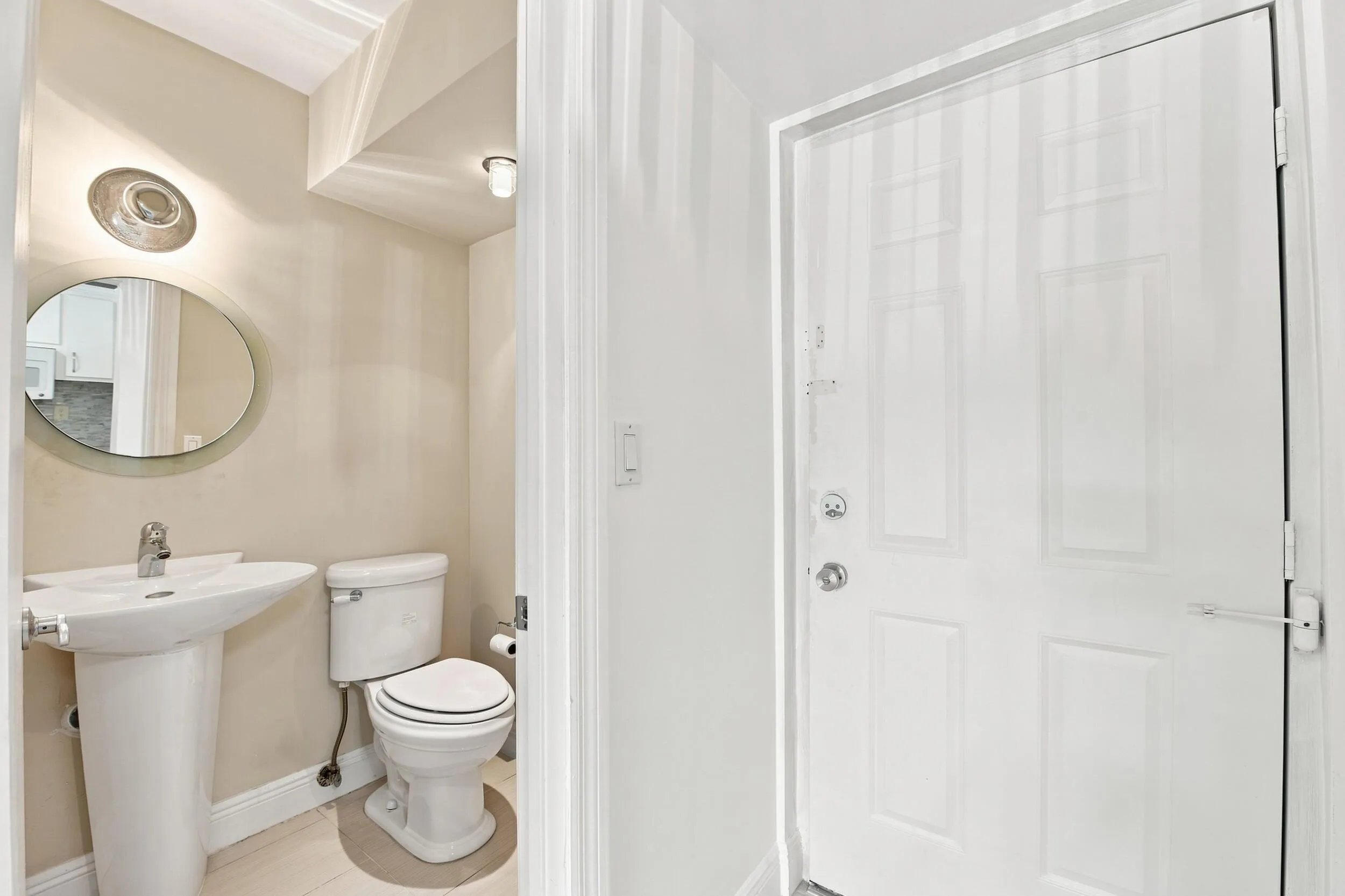 1.5 Bathroom_ across from Kitchen and next to entrance door