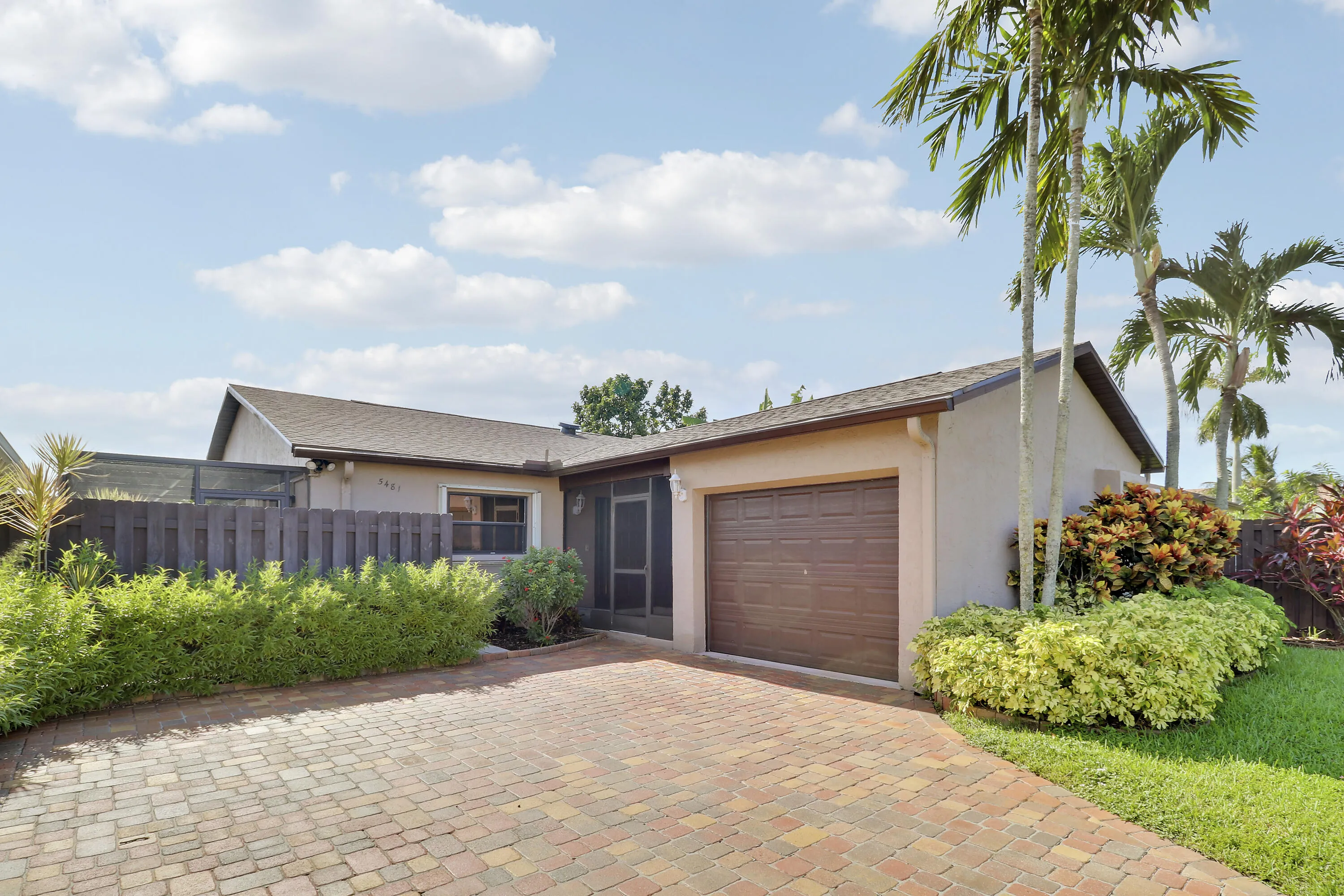 This home offers a one car garage and driveway pavers.