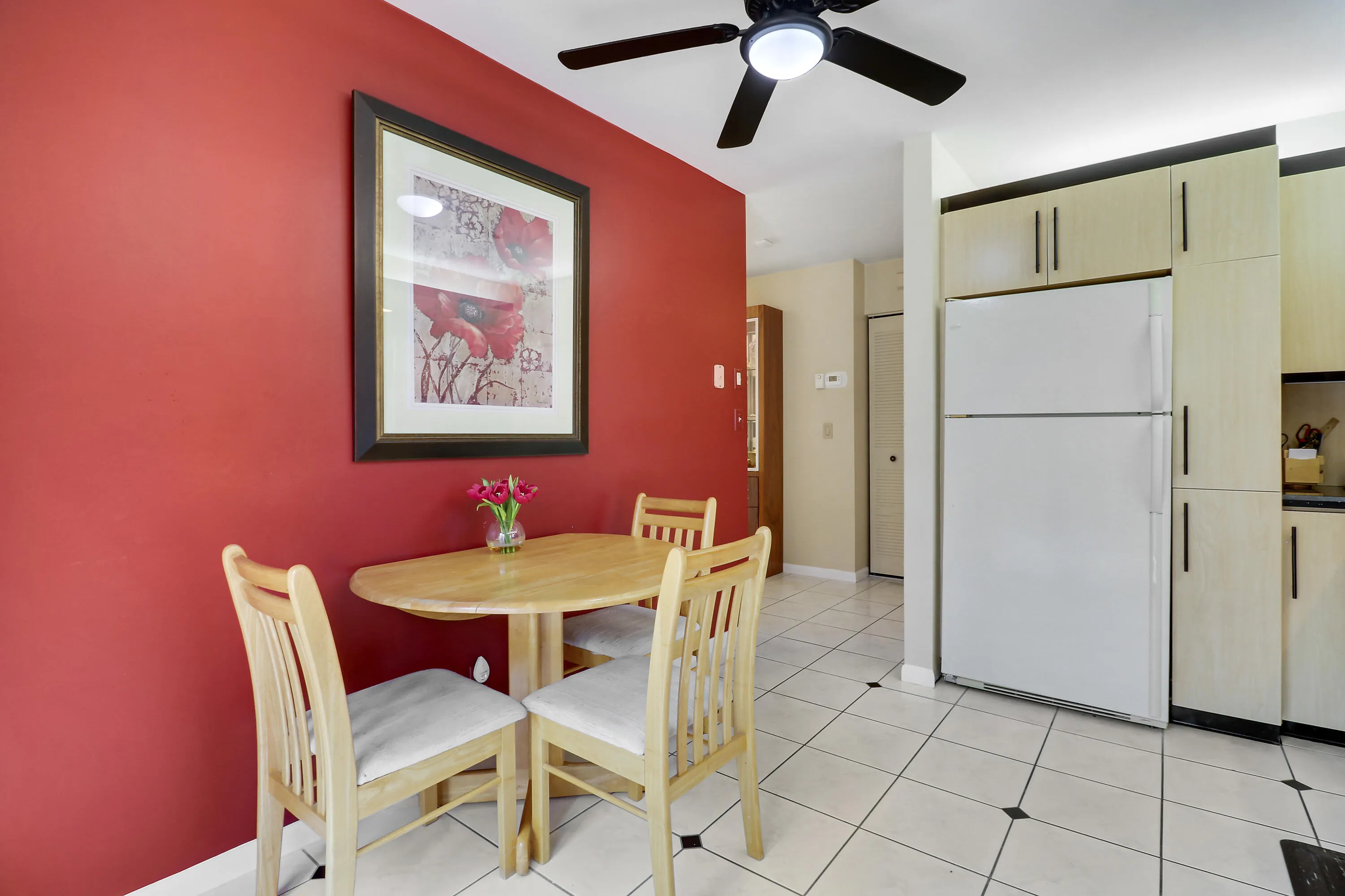 The kitchen exits to the front foyer.