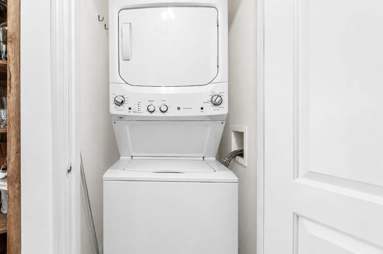 White stacked laundry appliances