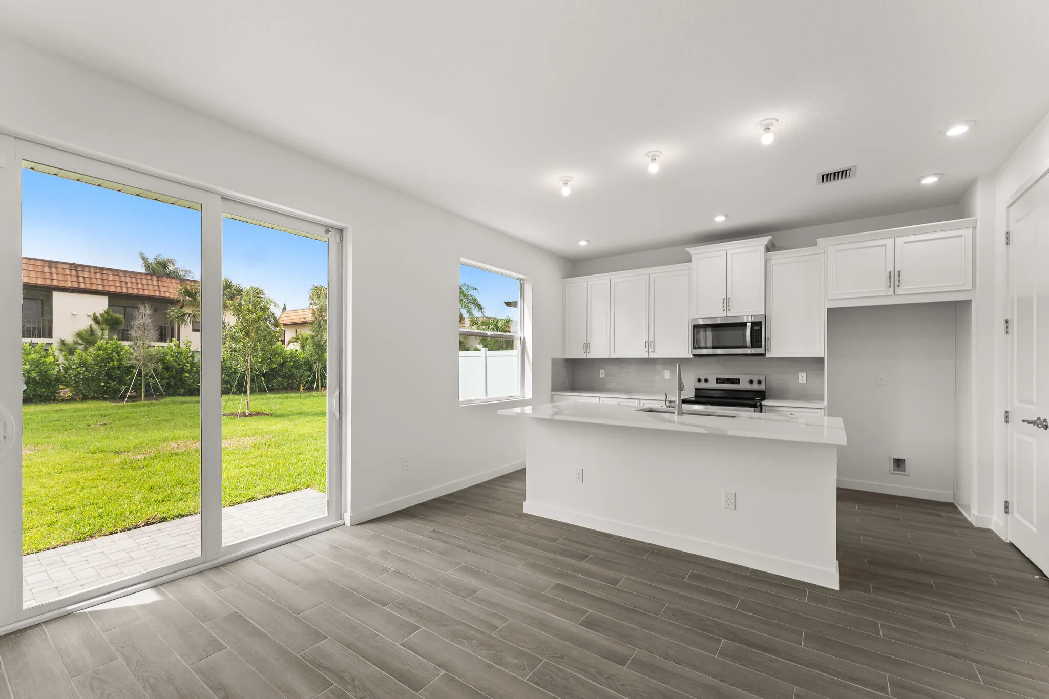Stock photos represent builder's floorplan