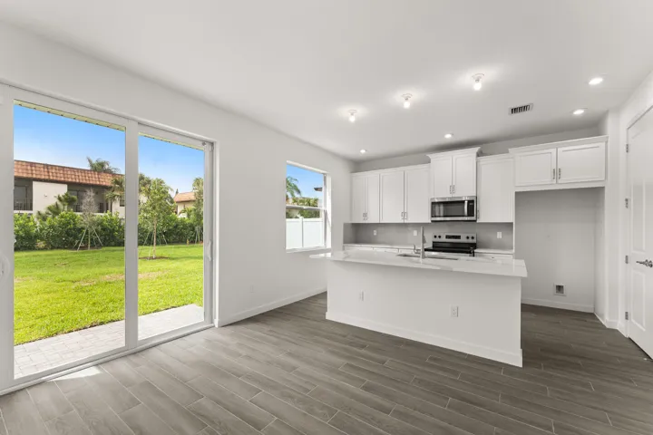 Stock photos represent builder's floorplan