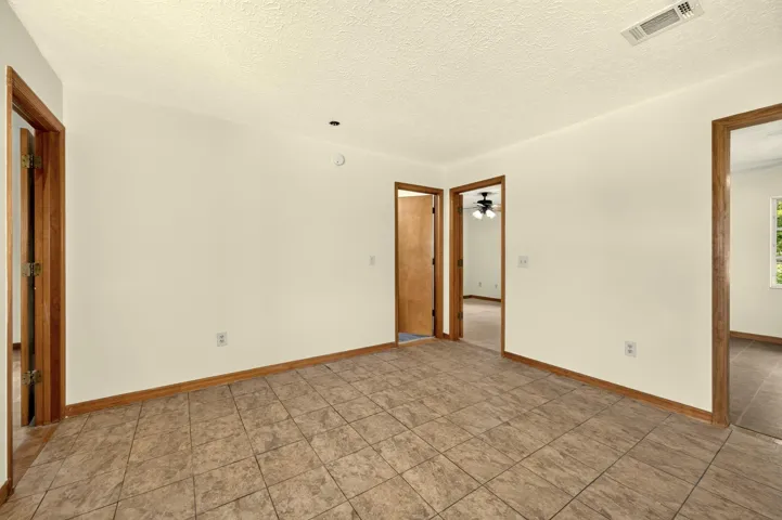 ENTRY TO BEDROOMS AND GUEST BATHROOM