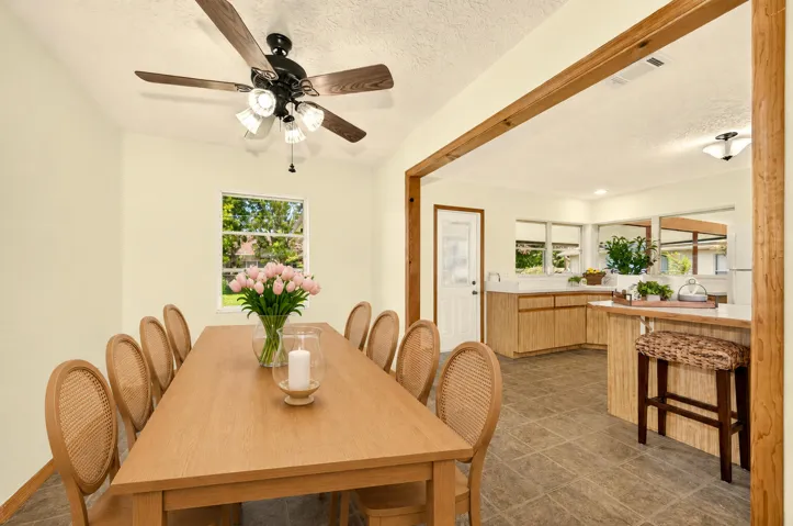 VIRTUALLY STAGED - DINING AREA opens to Kitchen and Living Room