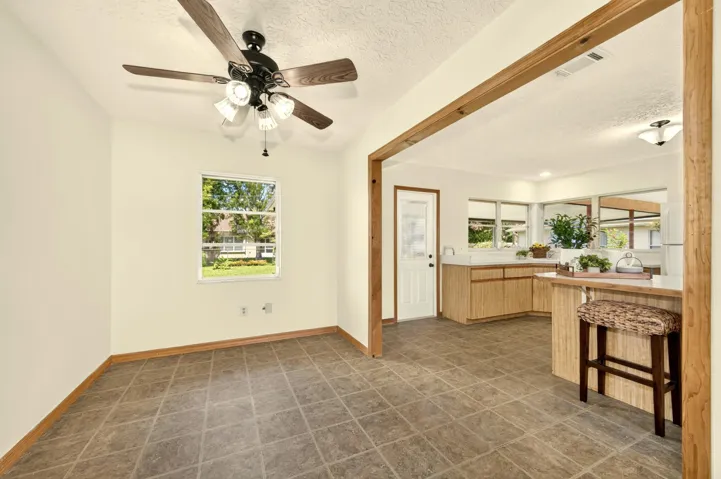 DINING AREA opens to Kitchen and LivingRoom.