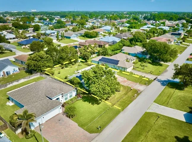 Discover the possibilities of this CBS Charmer located in a desirable neighborhood now surrounded by Newer Constructed Homes, further enhancing its appeal and potential. Ideal for INVESTORS, RENOVATORS and/or BUYERS with a Vision. 2BR, 2BA, 2CG with 500+sf covered screened lanai overlooking a spacious backyard with room to create your own outdoor retreat.