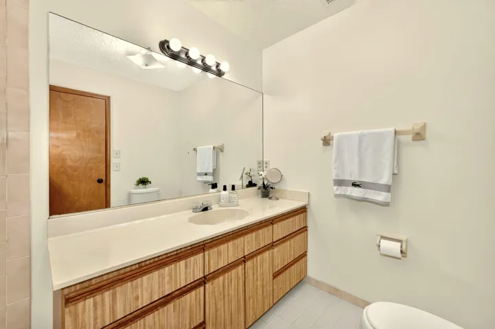 Ensuite bathroom with tub/shower.