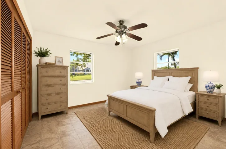 VIRTUALLY STAGED - BEDROOM 1 with ensuite bathroom, faces front yard.