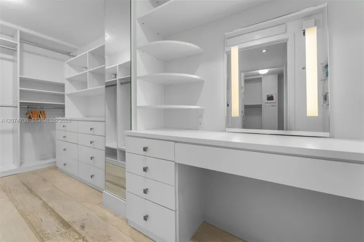 Primary Closet with vanity