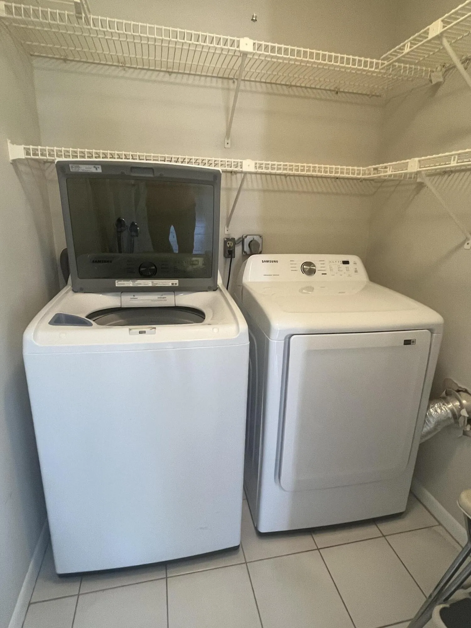 full side by side washer/dryer in the utility closet