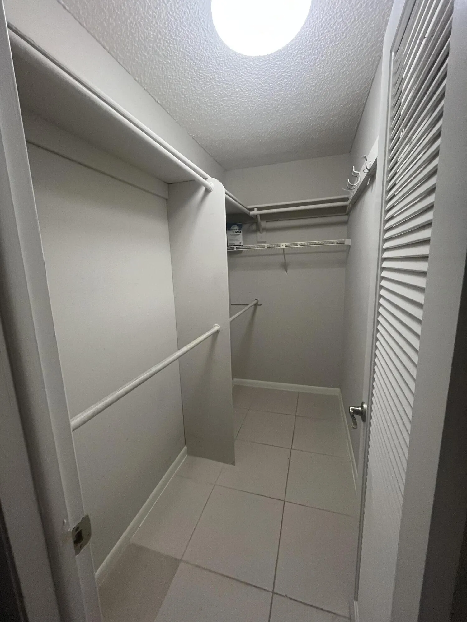 deep walk-in closet in the primary bedroom