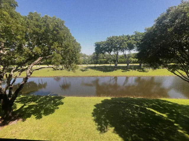 pond view from your screened in 23 X 6 patio facing north exposure (never any hot sun)