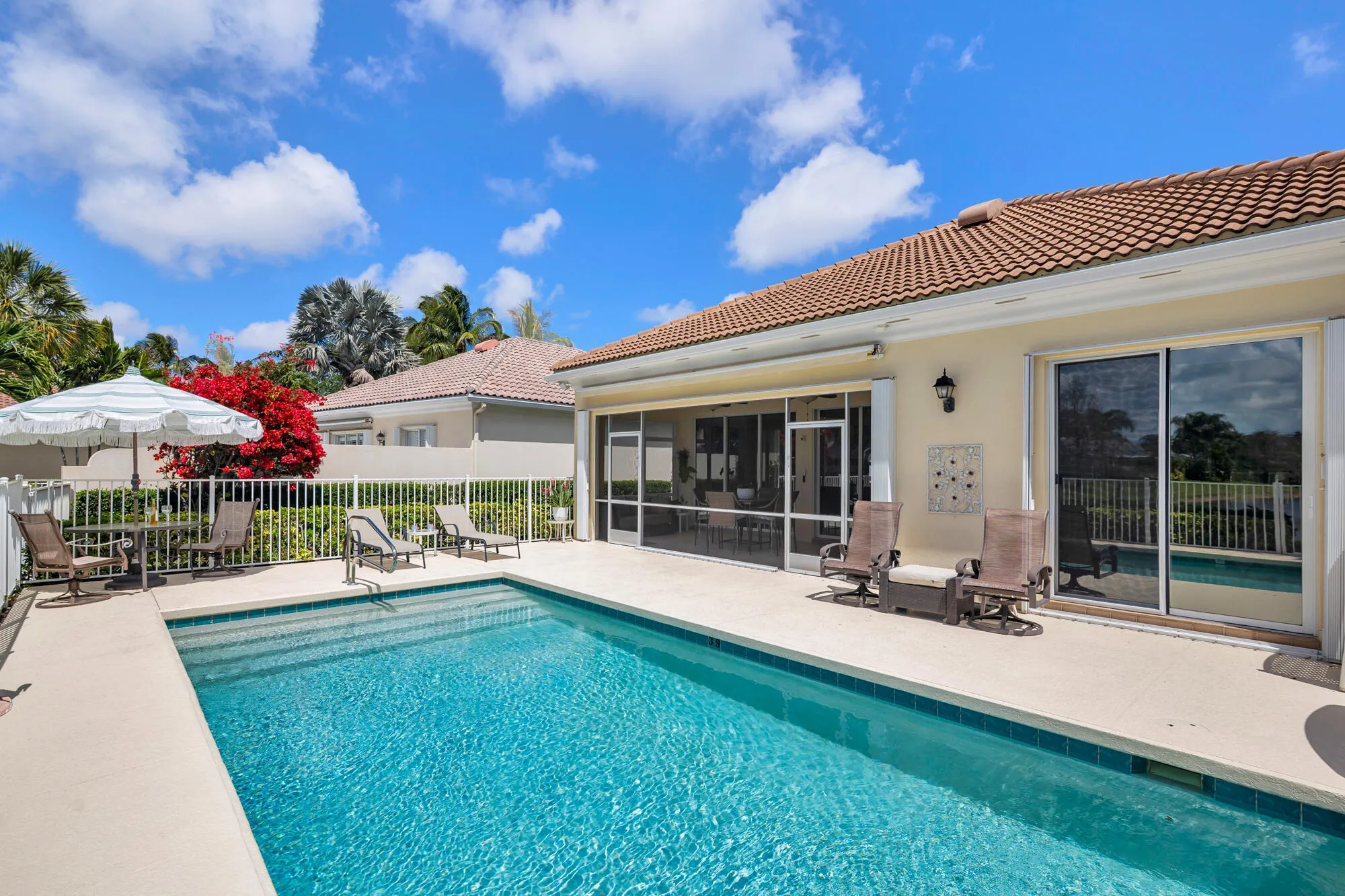 large fenced patio on lake